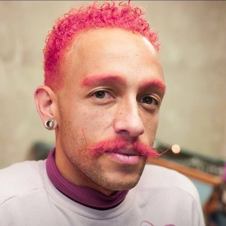 pink hair colour and mustache in berlin