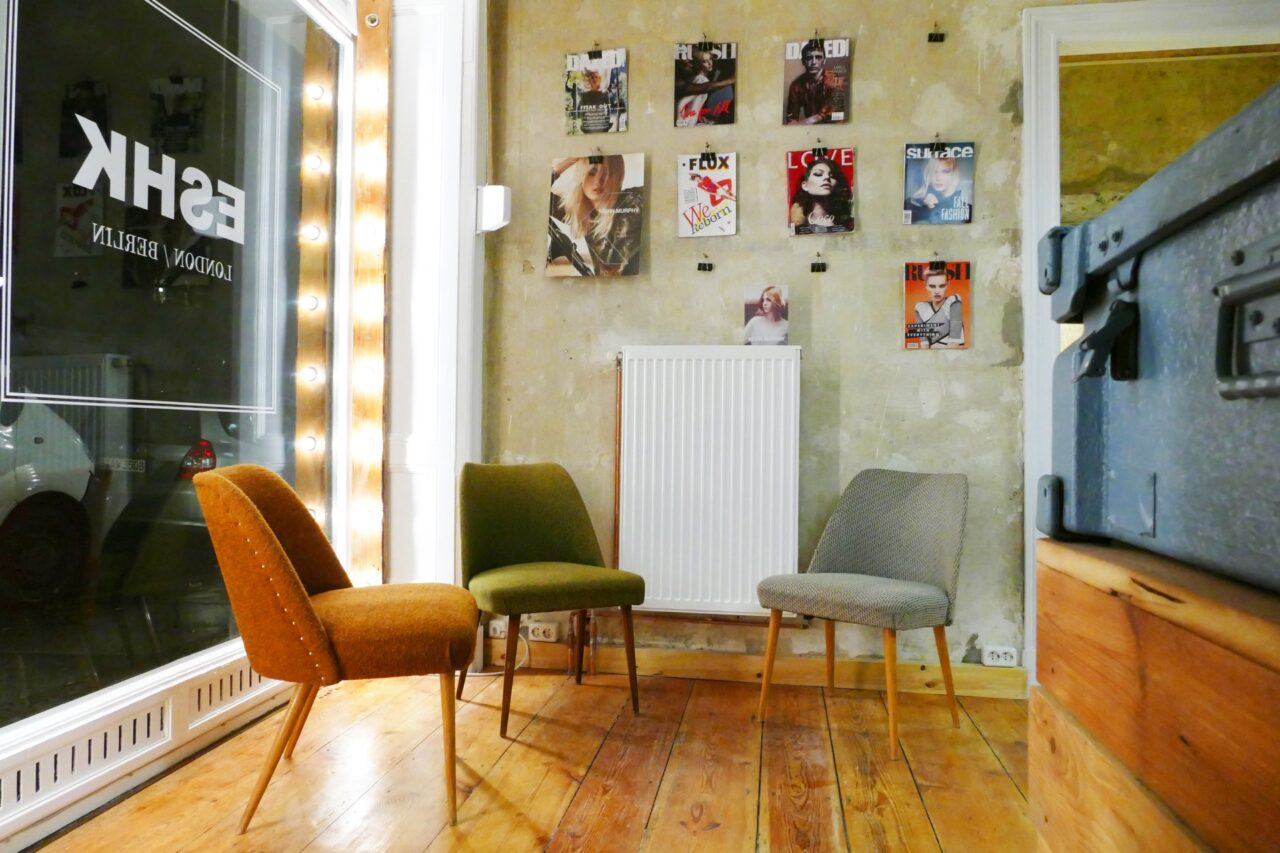 reception ESHK hairdresser neukolln coloured vintage chairs