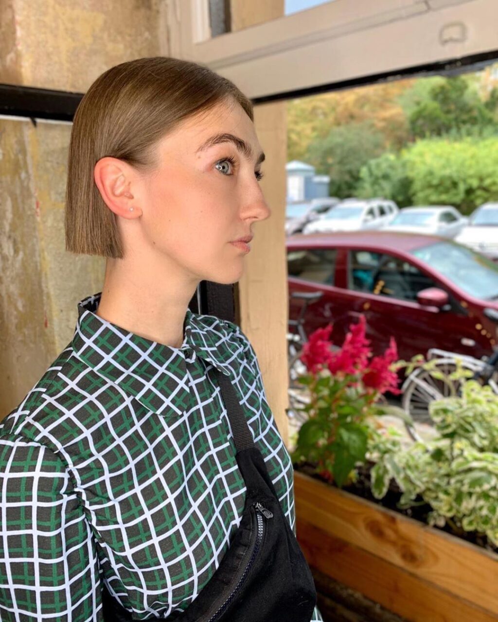 short dark blonde sharp bob haircut