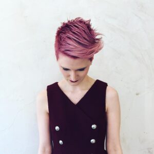 short purple to pink brushed to side womens haircolour and haircut