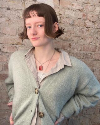 90s short fringe with flipped ends at eshk friseur moabit berlin