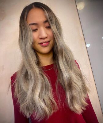 ash blonde balayage waves styling in shoreditch hair salon ESHK