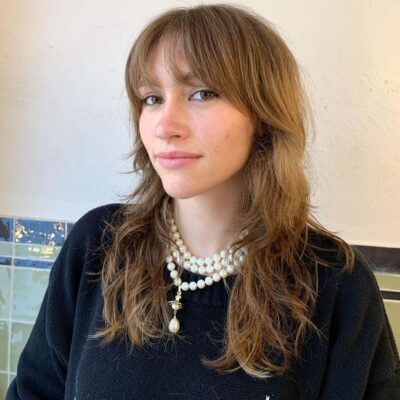 dark blonde long fringe wavey ends eshk friseur berlin hair salon