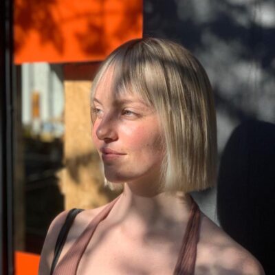 sharp middle length blonde haircut at eshk hairdresser in clerkenwell