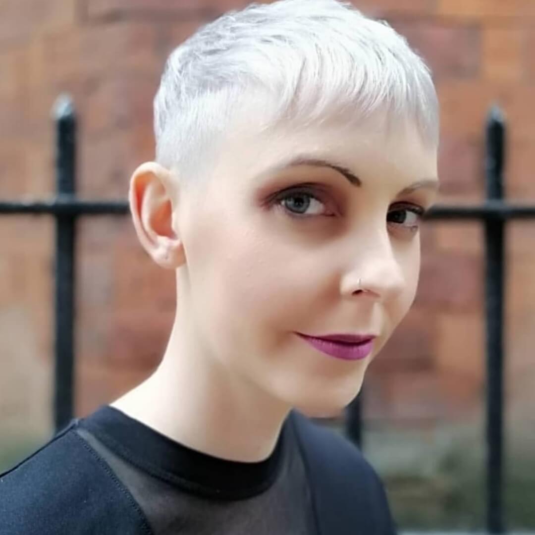 bleached pixie haircut with long fringe
