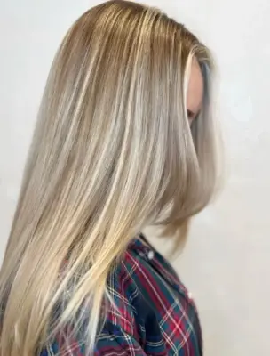 full blonde highlights with long layers at ESHK Hair Brooklyn