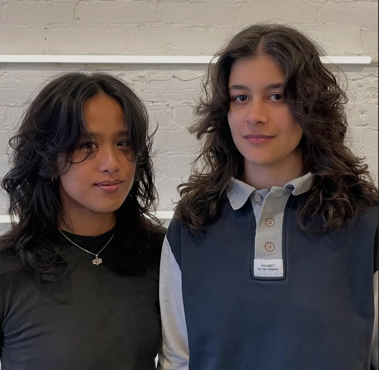 2025 hairstyle trends curly wolfcut centre parting by George ESHK Brooklyn hair salon